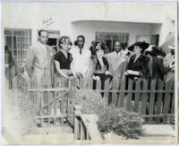 Elevator operator George Tate with others, Los Angeles, 1940s