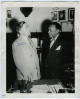 Eugene Biscailuz talking to Lionel Hampton, Los Angeles, 1940s