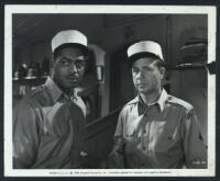 Kenny Washington and Dick Powell in a still from Rogues' Regiment