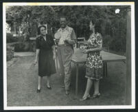 Sydney P. Dones and two unidentified women playing ping pong, Los Angeles, 1940s