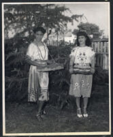 Two unidentified women at a garden party, Los Angeles, 1940s