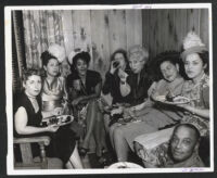 Alyce Key and other partygoers at a club, Los angeles, 1940s