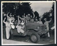 Ethel (Sissle) Gordon with soldiers and civilian women, Los Angeles, 1940s