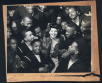 Marva Louis in a crowd of African American sailors, Los Angeles, 1940s