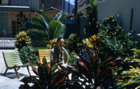 Mexico (Acapulco) - Donn Borcherdt in patio garden, between 1960-1964