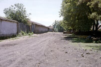 Chile (Curicó) - Fundo Curicó, dirt road with buildings, between 1966-1967