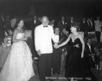 Edwin Pauley and his wife, Barbara Jean with Ethel Merman at the Pauley's 15th wedding anniversary party, 1952