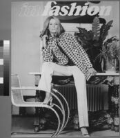 Oversized reprints of models wearing Cashin's fashion designs