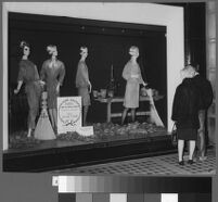 Photographs of Cashin's ready-to-wear designs for Sills and Co. featured in department store windows