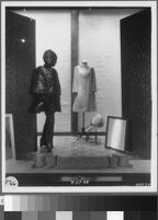 Photographs of Cashin's ready-to-wear designs for Sills and Co. featured in department store windows