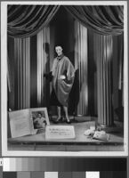 Photographs of Cashin's ready-to-wear designs for Sills and Co. featured in department store windows