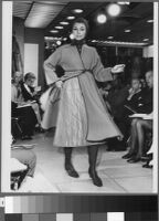 Black and white photographs of Cashin's fashion show at Sills and Co. showroom