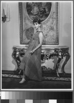 Black and white photographs of Cashin's ready-to-wear designs for Sills and Co., modeled in residential interiors including Cashin's New York apartment