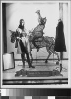 Photographs of Cashin's ready-to-wear designs for Sills and Co. featured in department store windows