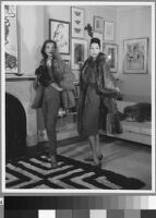 Black and white photographs of Cashin's ready-to-wear designs for Sills and Co., modeled in residential interiors including Cashin's New York apartment