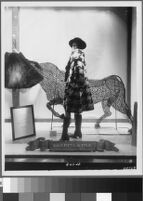 Photographs of Cashin's ready-to-wear designs for Sills and Co. featured in department store windows