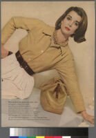 Oversized reprints of models wearing Cashin's fashion designs