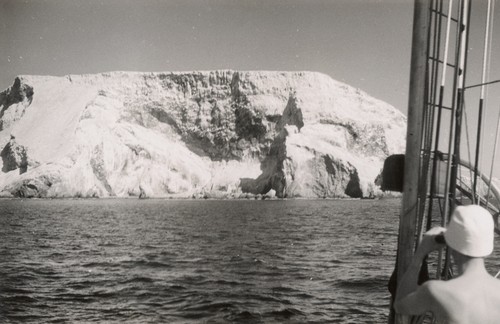 View of land over rigging of the E.W. Scripps