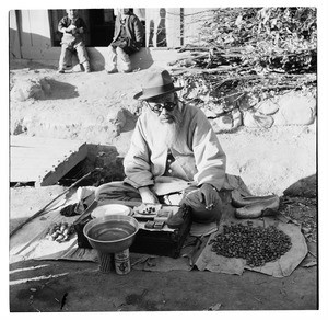Man selling herbs, South Korea 1956-59