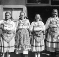 Closeup of 4 female Croatian dancers in costume