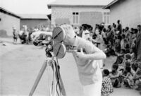 Mantle Hood in Ghana, filming "Atumpan: the Talking Drums of Ghana."