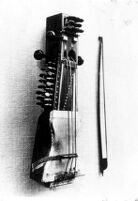 Close-up of a sarangi with bow