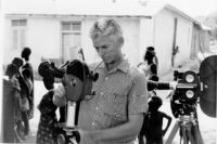 Mantle Hood in Ghana, filming "Atumpan: the Talking Drums of Ghana."