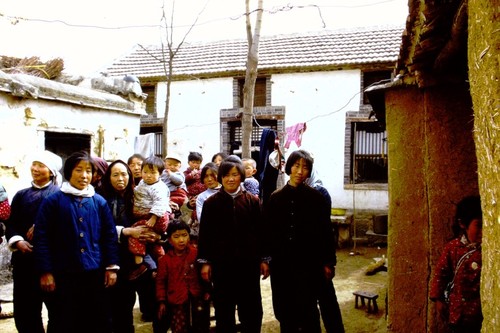 People gathering in courtyard (1 of 2)