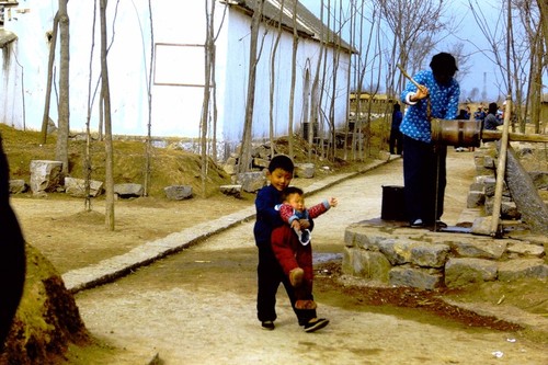 Villagers by the well