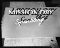 Logotype for the "Mission Dry Sparkling" beverage set up to be photographed, Los Angeles, circa 1930