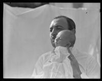Raymond Griffith with his infant son Michael Griffith, Los Angeles County, 1933-1934