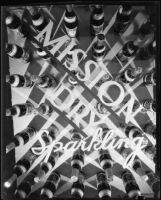 Photomontage with Mission Dry Sparkling beverage bottles arranged in a grid with the logotype above, Los Angeles, circa 1930