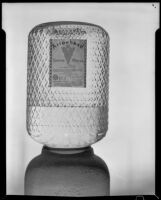 Ornate Arrowhead water cooler bottle embossed with logo arrowheads over the entire surface, Los Angeles, 1935