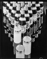 "Mission Dry Sparkling" beverage bottles arranged in a triangle, Los Angeles, circa 1930