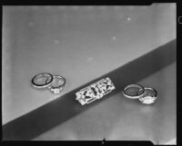 Diamond rings and brooch at the Brock & Company jewelry and gift store, Los Angeles, 1930
