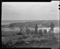 Barse Miller, painter and muralist, painting outdoors with three other artists, 1930-1939