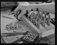 Valves for a cornet or trumpet at the F. E. Olds and Son plant, Los Angeles, 1933-1939