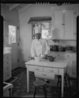 Chef in the kitchen of the William Conselman Residence, Eagle Rock, 1930-1939