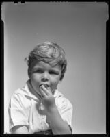 Boy eating a Sunkist brand date