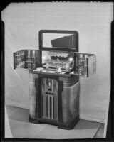 Radiobar with the bar cabinet open at the Brock & Company jewelry and gift store, Los Angeles, 1935-1938