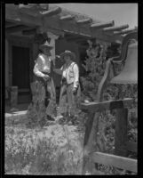 William Penhallow Henderson and Alice Corbin Henderson outside their house, Santa Fe, 1932