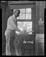 Stanley Reckless drawing in the studio of his Silver Lake home, Los Angeles, 1930-1939