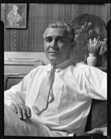 Stanley Reckless seated in the studio of his Silver Lake home, Los Angeles, 1930-1939