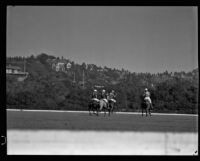 Raymond Griffith, Darryl Zanuck, Lucian Hubbard and Dave Whyte playing polo, Los Angeles, 1931