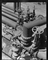 Gas regulator equipment probably created by the Wilgus Manufacturing Company in an oil field, California, circa 1931