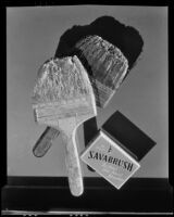 Dirty paint brushes in an advertisement photograph for Savabrush, 1925-1939