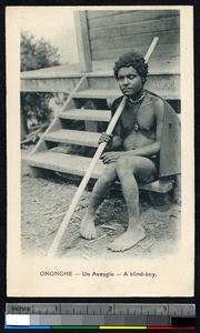 Blind man sitting on the steps, Ononge, Papua New Guinea, ca.1900-1930
