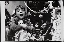 Girl with Doll at Christmastime Photograph