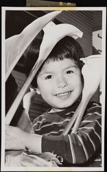 Boy with Peace Lilies Photograph
