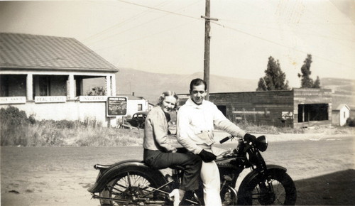 Man and Woman on Motorcycle